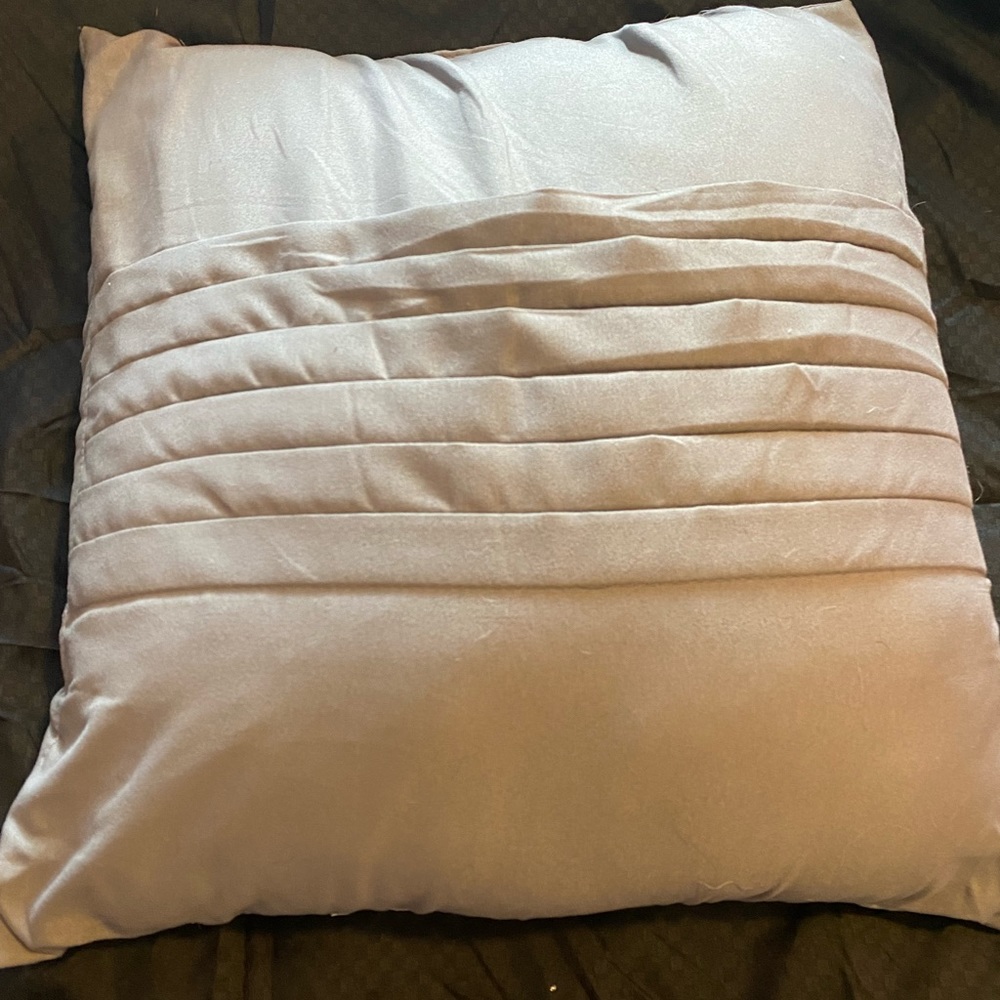 Grey throw pillow
